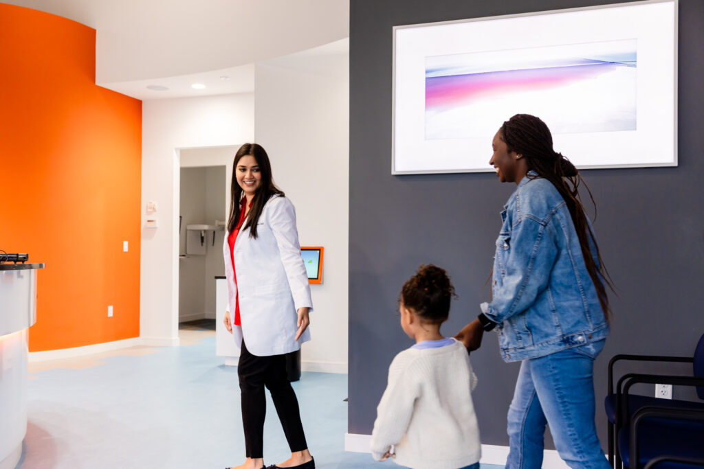 Parent scheduling her kids teeth cleaning for children in Gainesville appointment.
