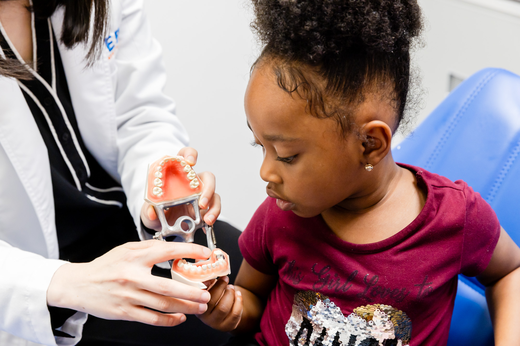 Patient at our pediatric dental office in Herndon, VA, during her consultation.